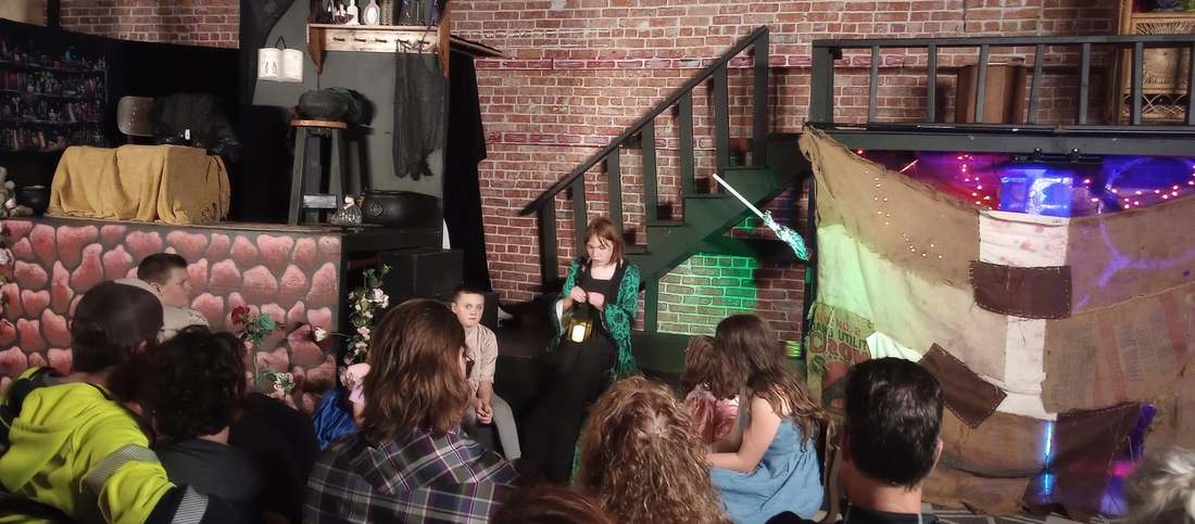 Young Acting Academy performers presenting Frankenstein before an audience