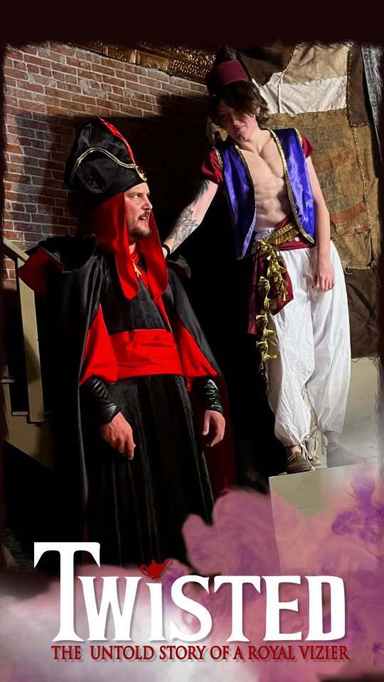 Twisted promo photo — the Royal Vizier in red and black beside the prince