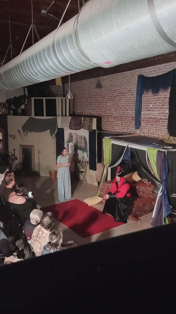 A quiet Twisted scene between the princess and the seated Vizier