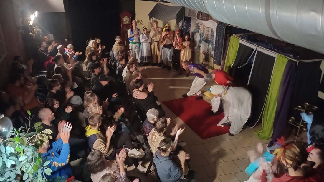 A deep bow at the Twisted curtain call as the audience applauds