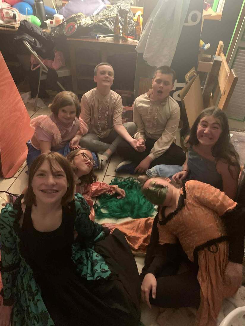 Young Frankenstein cast members gathered together in costume